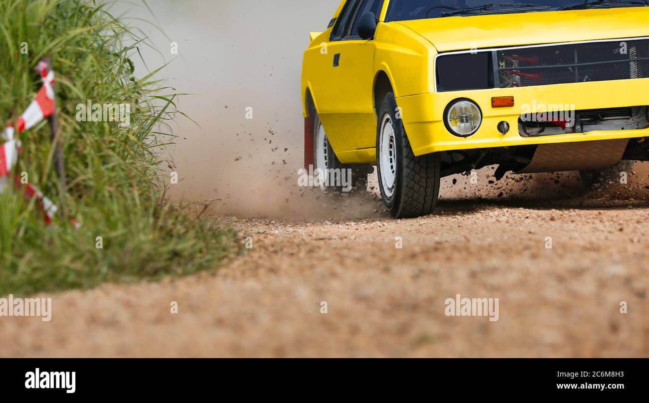 Rally race car drifting on dirt track. Stock Photo
