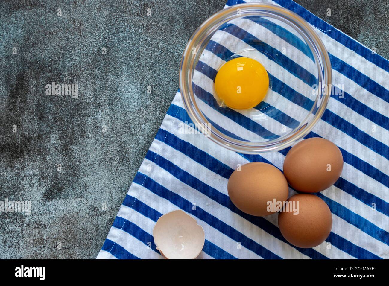 View of raw eggs, with their shells Stock Photo Alamy