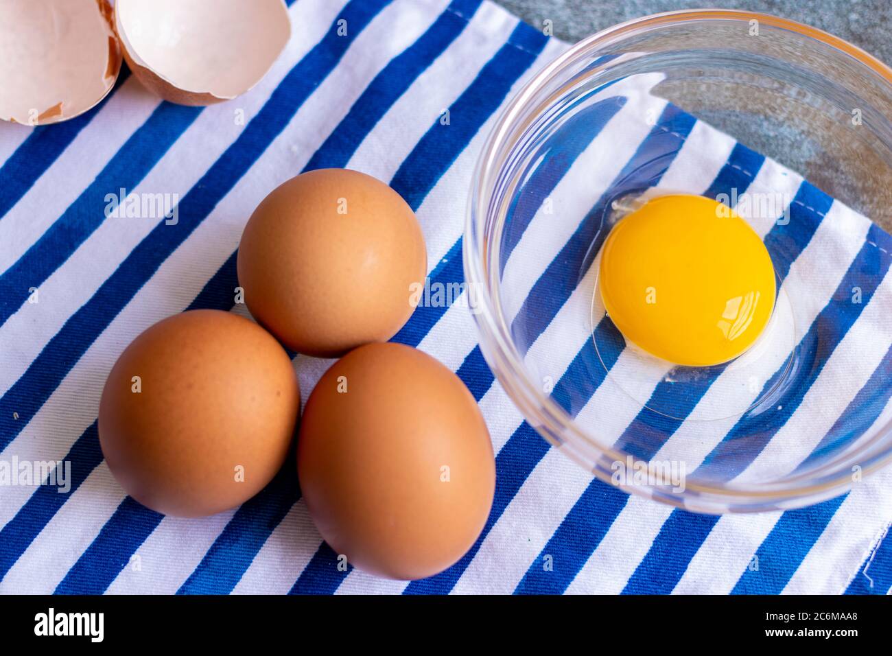 View of raw eggs, with their shells Stock Photo Alamy
