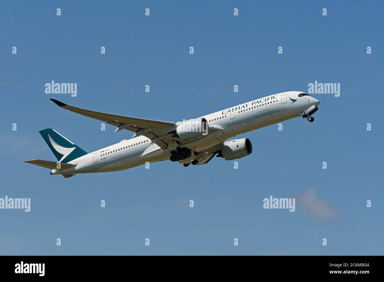 Richmond, British Columbia, Canada. 10th July, 2020. A Cathay Pacific Airways Airbus A350-900 (B-LRA) wide-body jet takes off from Vancouver International Airport on a flight from Vancouver to Hong Kong, July 10, 2020. Credit: Bayne Stanley/ZUMA Wire/Alamy Live News Stock Photo