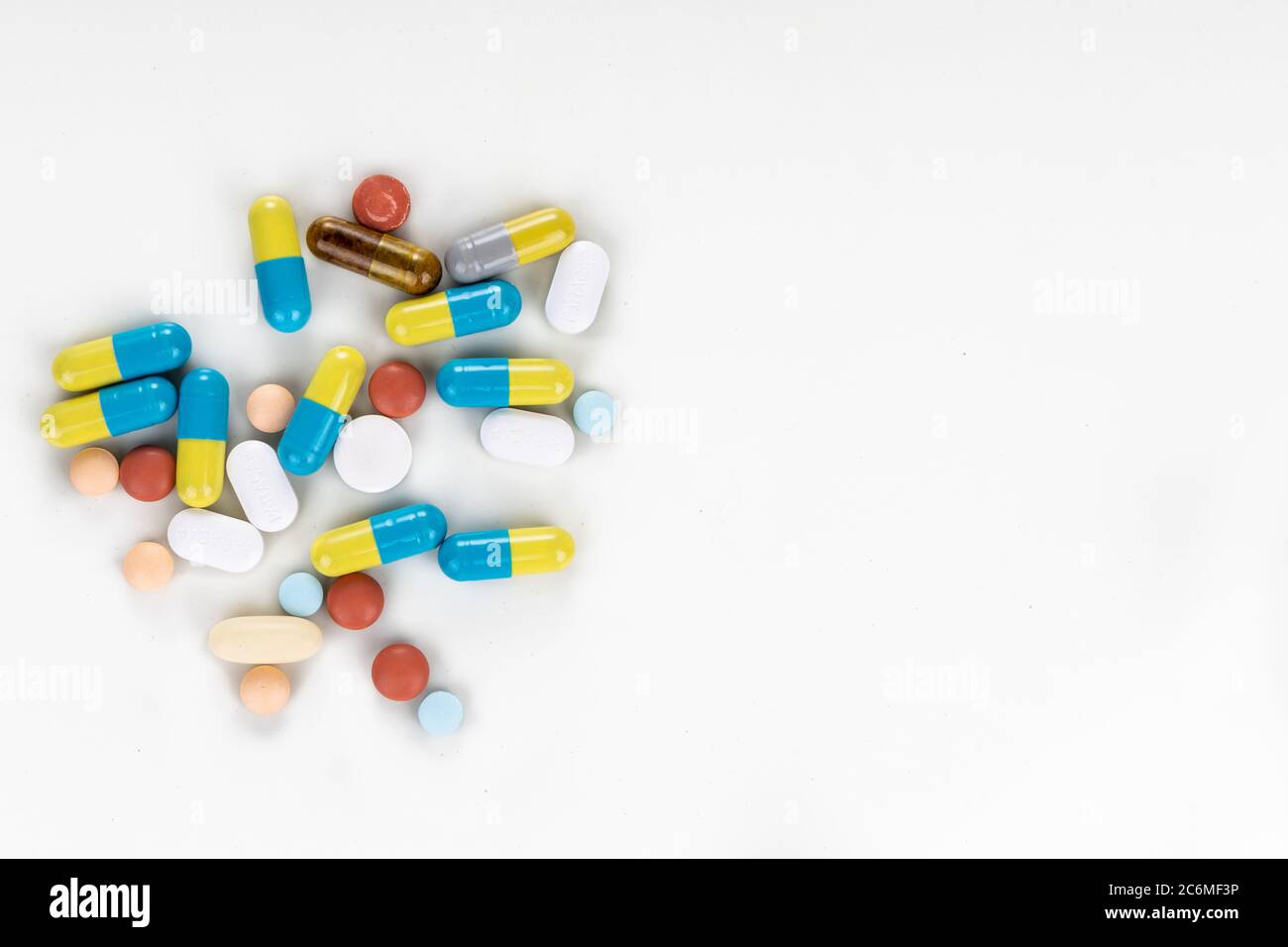 Overhead view of multiple pills, tablet, caplet, capsule. Medication