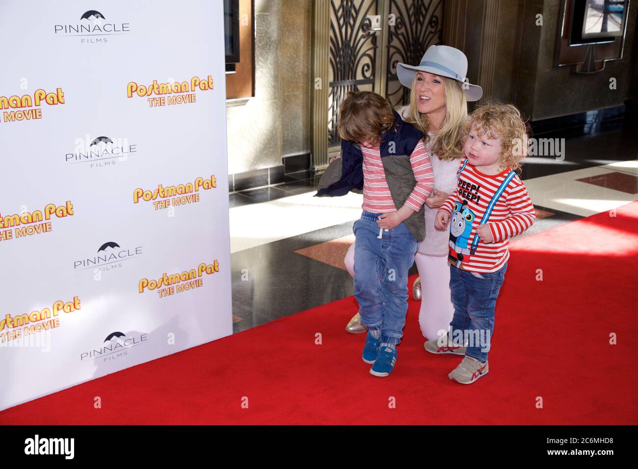 Australian news presenter and journalist with Sky News Australia, Jacinta Tynan and her children on the red carpet at the Postman Pat movie at Hoyts E Stock Photo