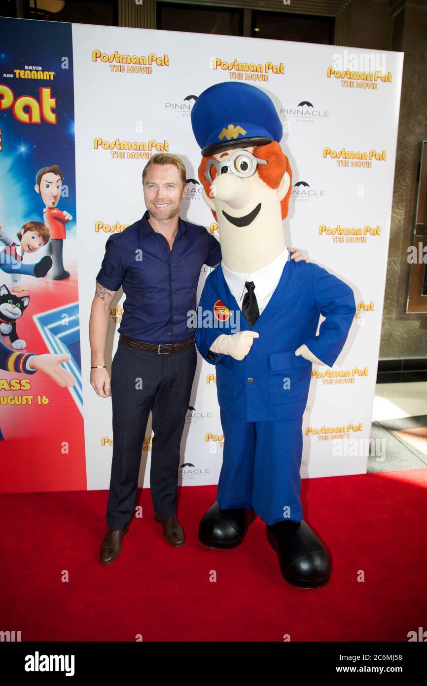 X Factor judge Ronan Keating and Postman Pat on the red carpet at the Postman Pat movie at Hoyts Entertainment Quarter, Moore Park in Sydney. Stock Photo