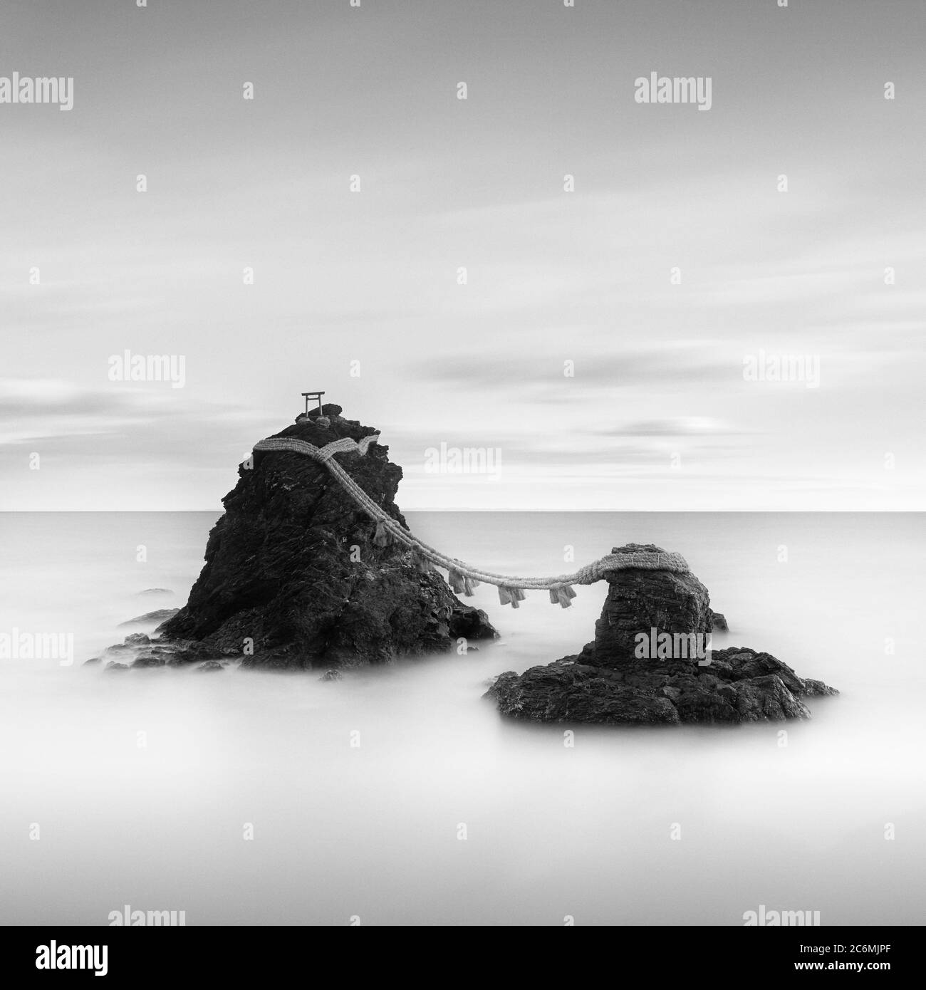 Long exposure shot of Meoto-iwa rock and clouds in the morning, Mie Prefecture, Japan Stock Photo