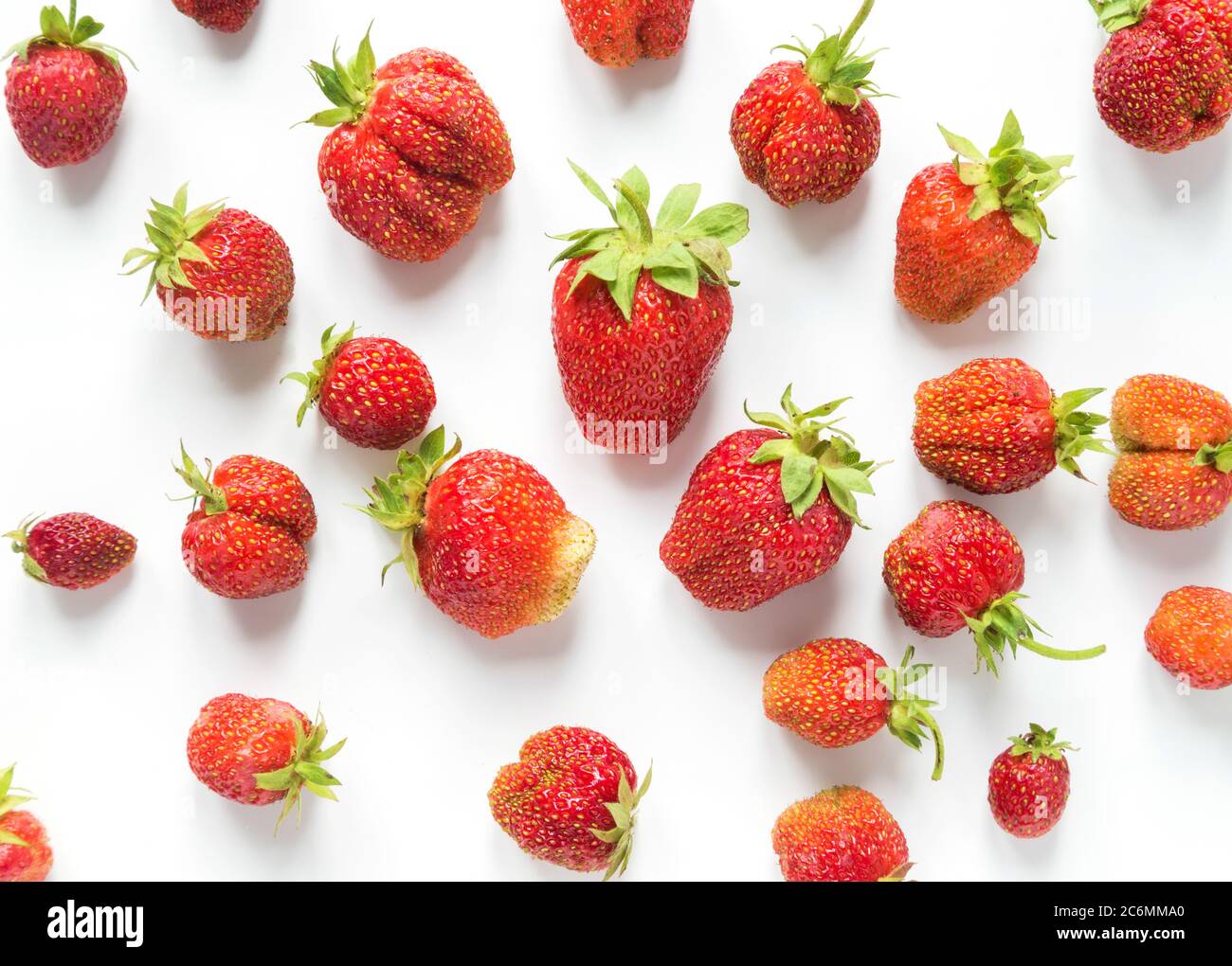 Ripe strawberries isolated on a white background Stock Photo - Alamy