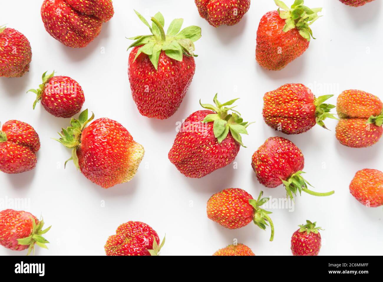 Ripe strawberries isolated on a white background Stock Photo - Alamy