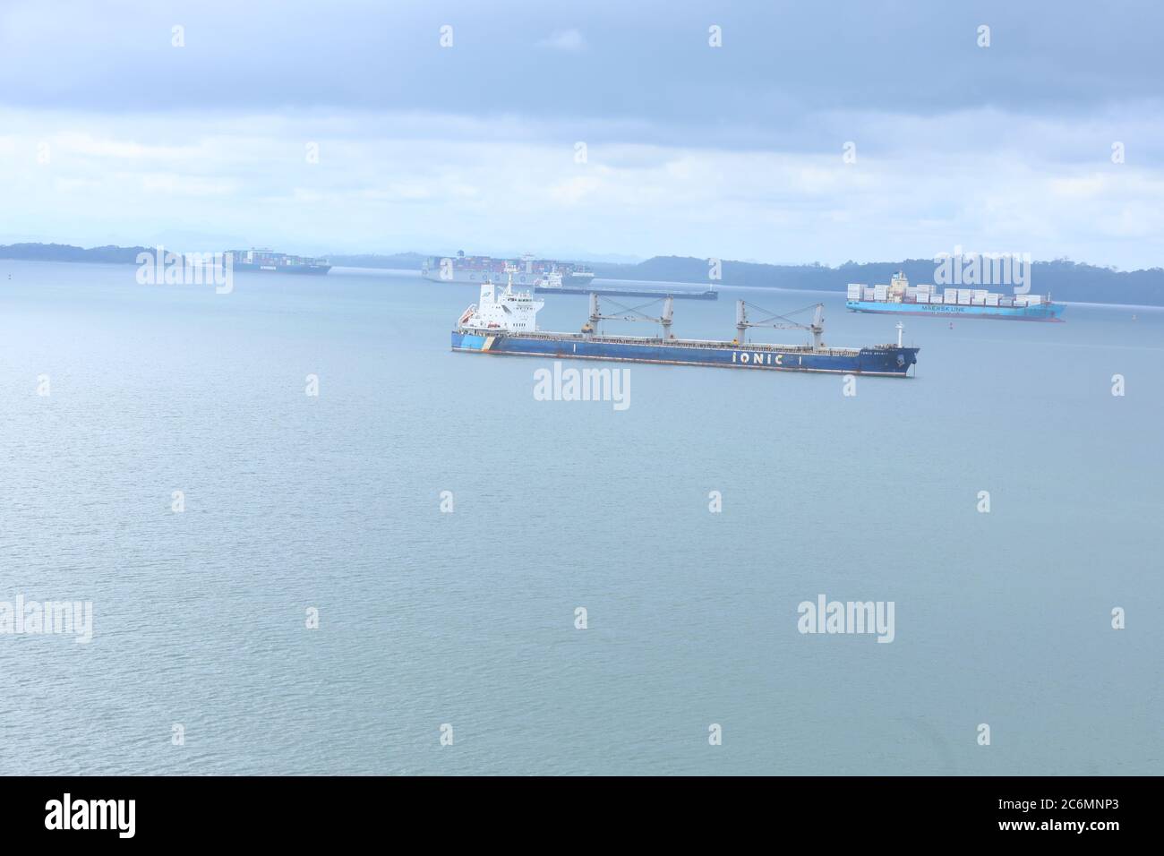 ship sailing through Gatun Lake during her transit through Panama Canal ...