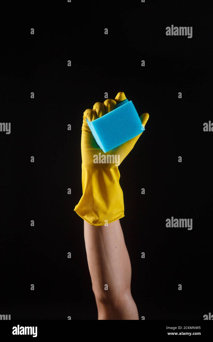 cleaning products, blue sponge for hands with yellow rubber gloves Stock Photo Alamy