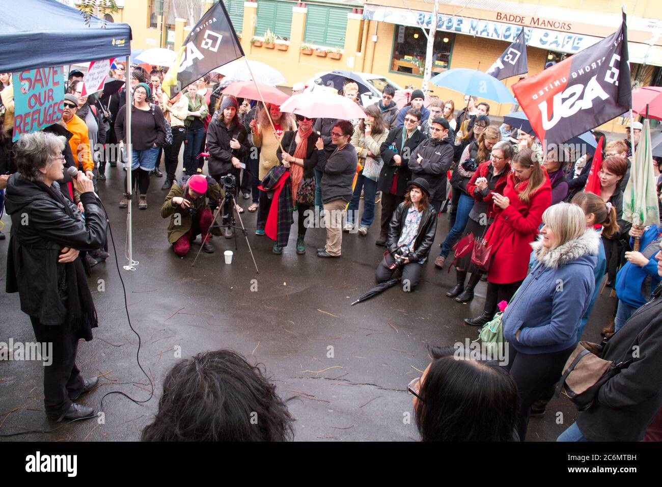 A speaker addresses the rally to save women’s refuges from closure at