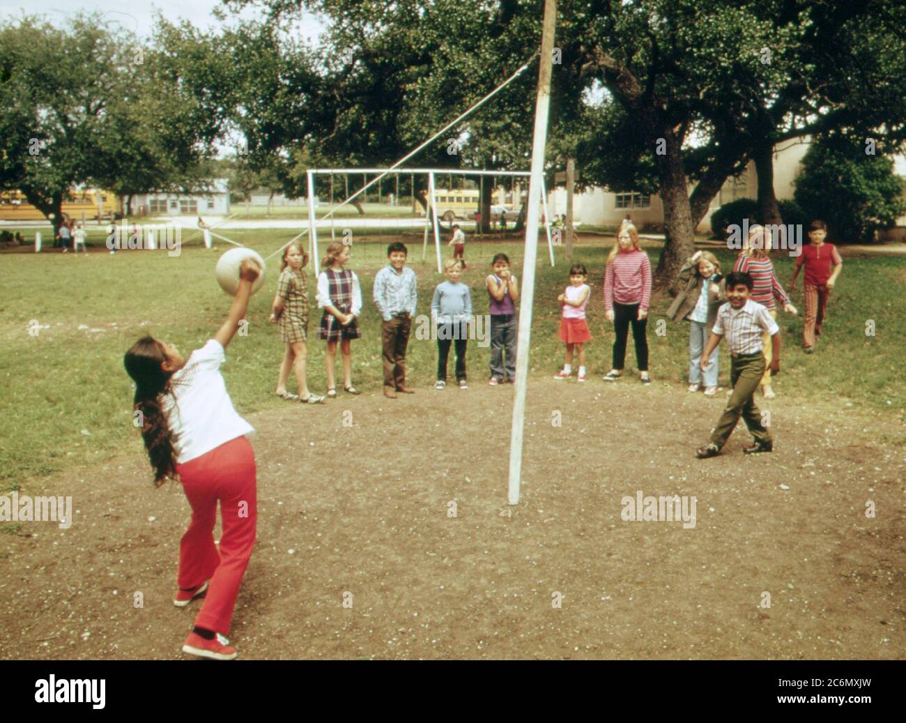 Elementary school children in Leakey Texas play tetherball at