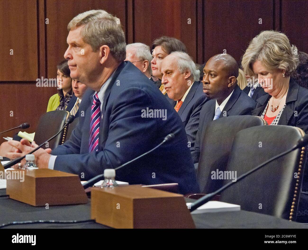 Agriculture Secretary Tom Vilsack visited the Senate Committee on Agriculture, Nutrition and Forestry, in Washington, DC, Thur., May 26, 2011.  to discuss the next Farm Bill. Directly behind Secretary Vilsack are from left: former Secretary Dan Glickman, Karis Gutter, Acting Deputy Undersecretary, Farm and Foreign Agricultural Service and Susan Palmeri, Acting Assistant Secretary, Congressional Relations. Secretary Glickman was a member of the witness panel to speak after Secretary Vilsack. The second panel included a farmer and members of marketing, research and academics who discussed the fu Stock Photo