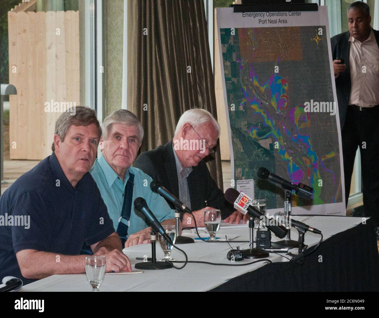 From left: Agriculture Secretary Tom Vilsack, Senator Ben Nelson, Nebraska a member of the Senate Committee on Agriculture, Nutrition and Forestry and Dayle Williamson, State Agriculture Representative for Senator Nelson at a town hall meeting at the Marina Inn in South Sioux City, Nebraska Fri., June 17, 2011 on the floodwaters along the Missouri River affecting Iowa and Nebraska. The goal of the meeting and the conversations with the producers and community leaders is to get a firsthand look and provide that information back to Washington necessary to better deliver disaster programs expedit Stock Photo