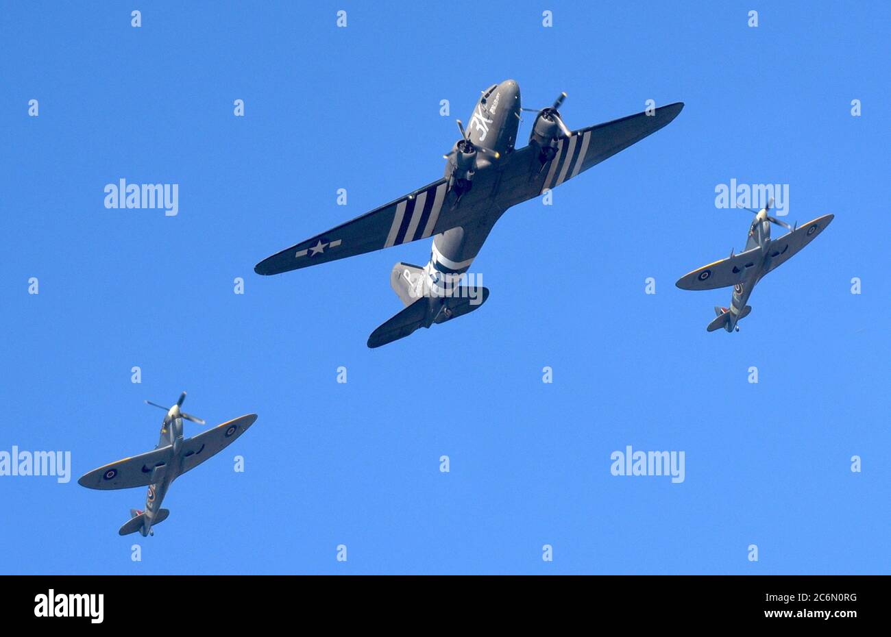 A fly pass of two spitfires and a C-47 Dakota as part of Remembrance Day Sunday 2019 tributes to the fallen of WWI and WWII. Stock Photo