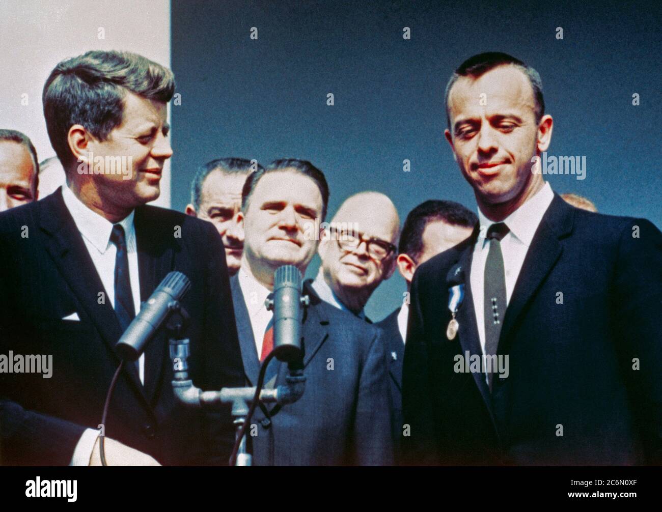 (8 May 1961) --- President John F. Kennedy (left) congratulates NASA's Distinguished Service Medal Award recipient astronaut Alan B. Shepard Jr. in a Rose Garden ceremony on May 8, 1961, at the White House. Stock Photo