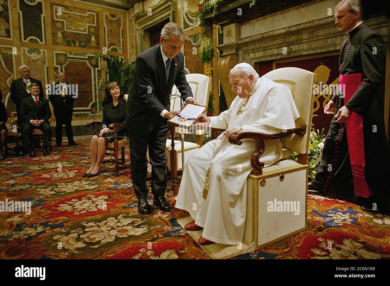 President George W. Bush presents the Medal of Freedom to Pope John Paul II June 4, 2004, during a visit to the Vatican in Rome, Italy.  Photo by Eric Draper, Courtesy of the George W. Bush Presidential Library and Museum Stock Photo