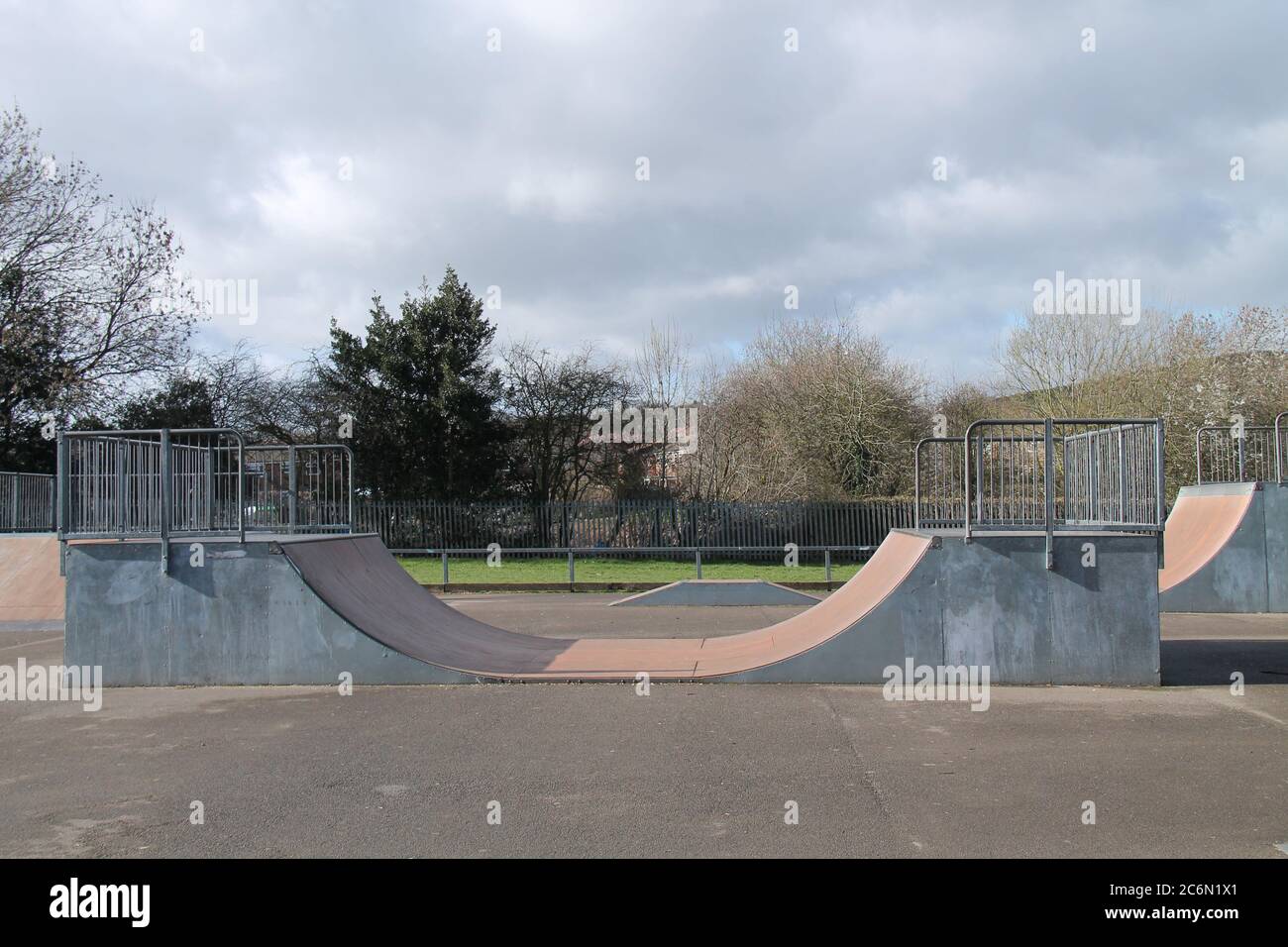 Some Obstacles and Jumps on a Skateboard Park. Stock Photo