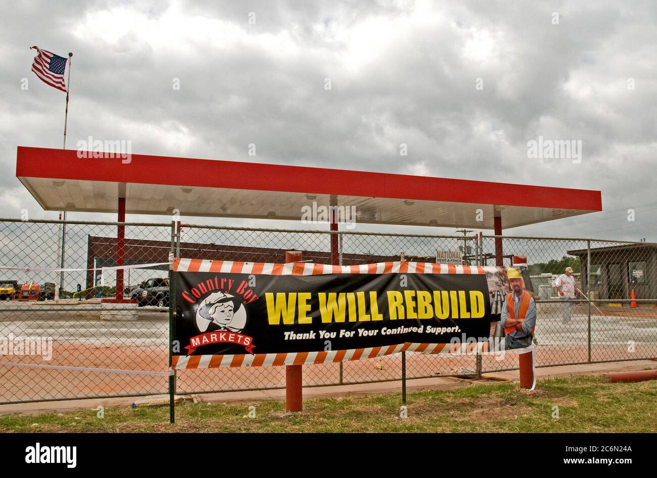 Norman,OK, June 12,2010A construction worker cleans the ground where