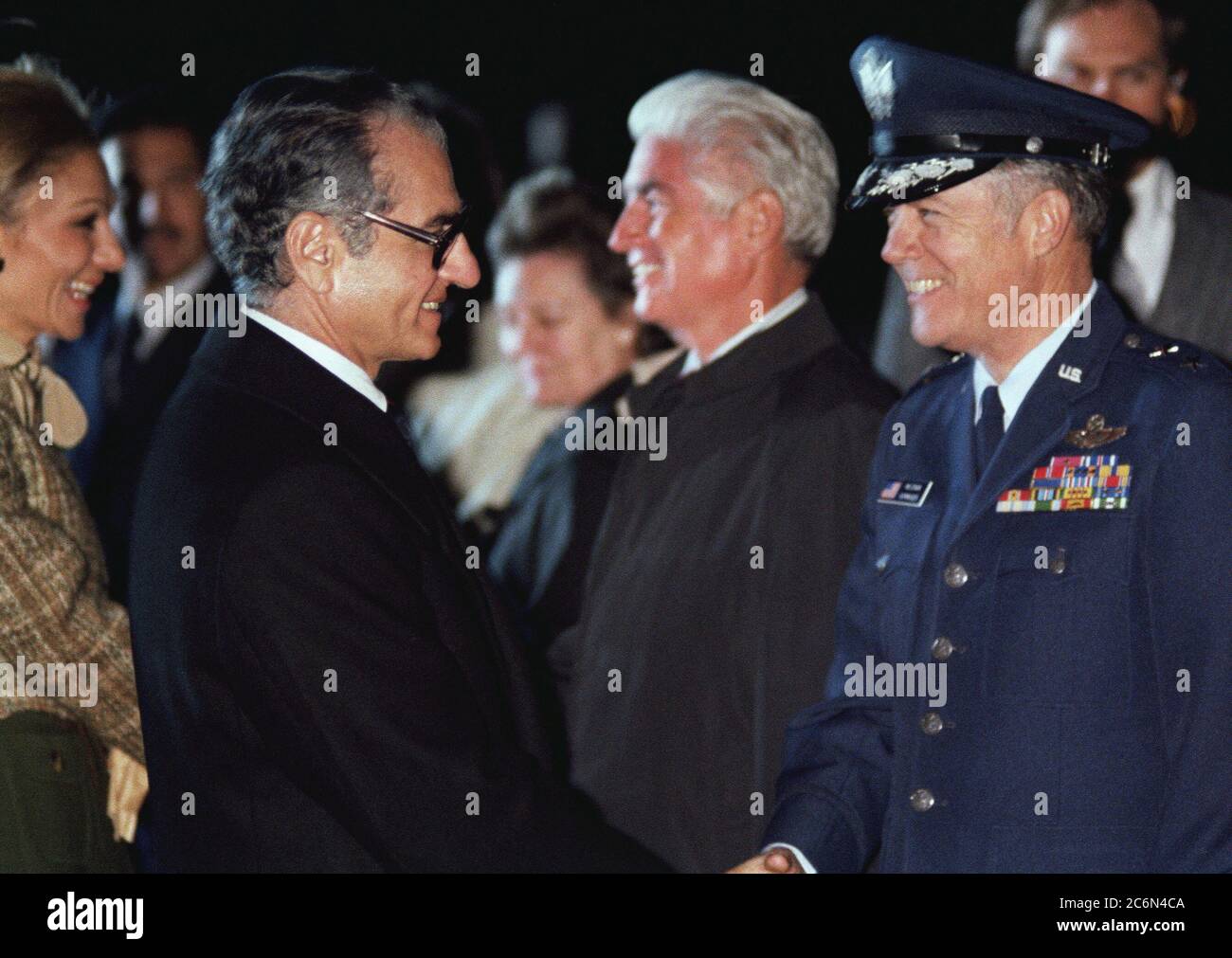 1977 - Mohammed Reza Pahlavi, Shah of Iran, shakes hands with a US Air Force general officer prior to his departure from the United States. Stock Photo