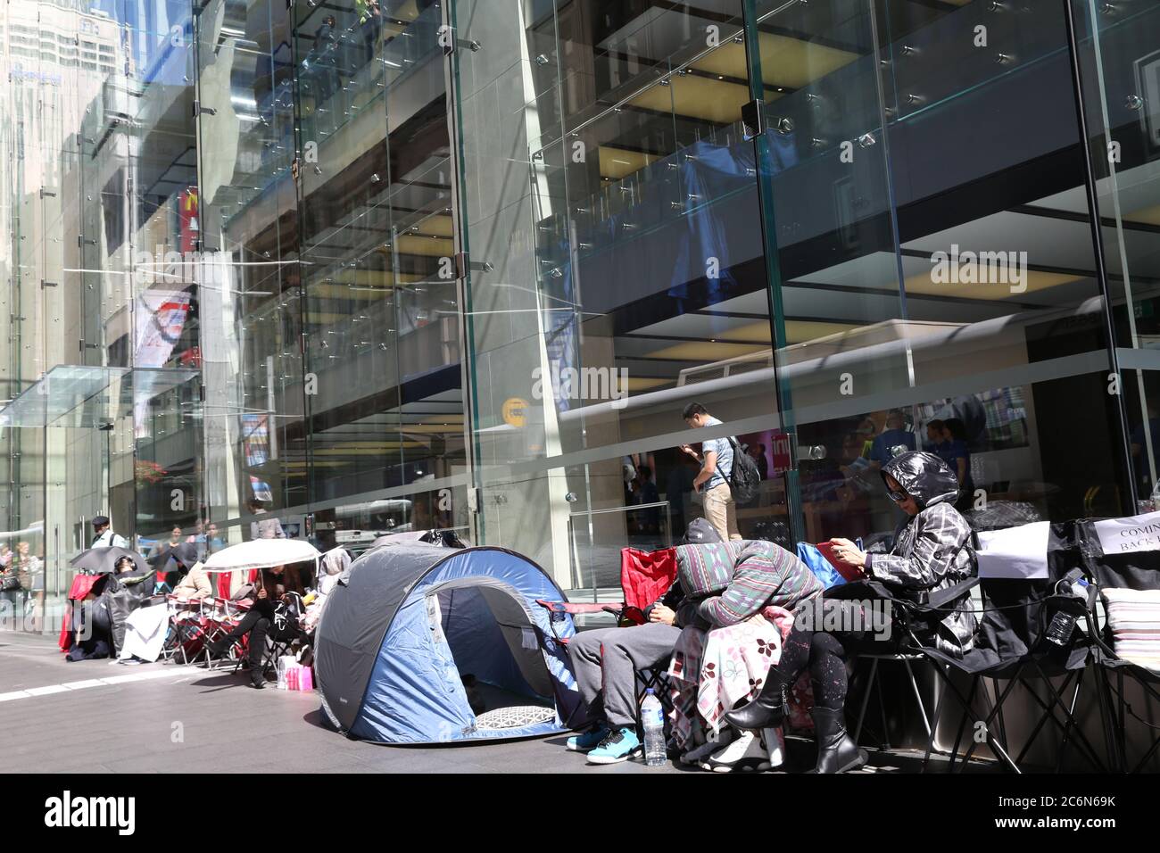 The queue on George Street, Sydney outside the Apple store ahead of the iPhine 6 launch. Stock Photo