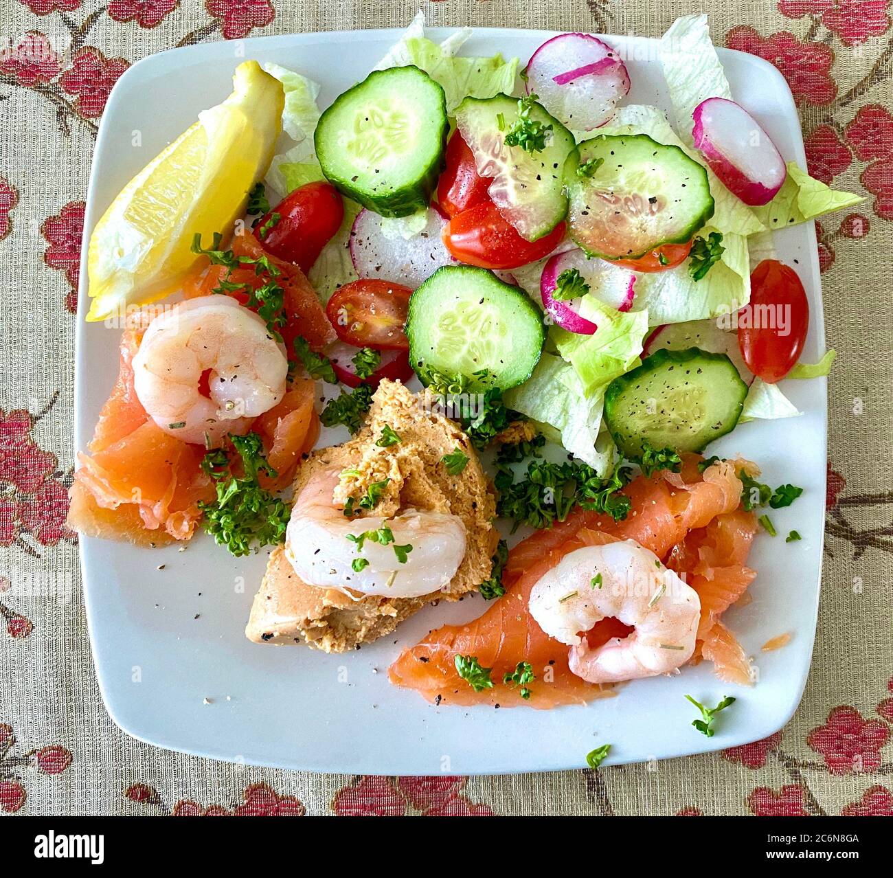 Deluxe seafood salad of crab, smoked salmon and prawns, with a green