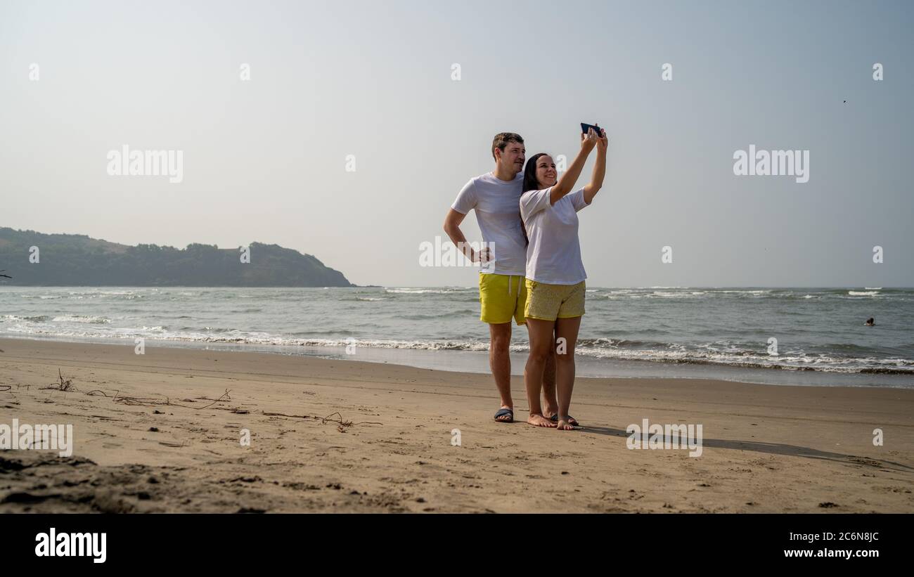 Happy couple taking selfies hi-res stock photography and images - Alamy