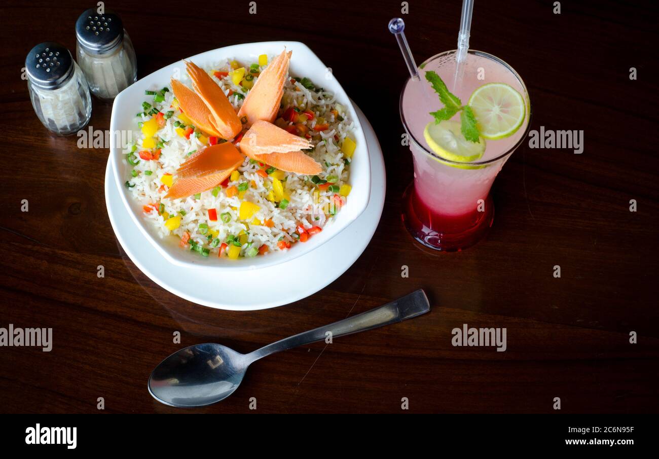 Tasty Fried Rice pasta with great presentation Stock Photo - Alamy