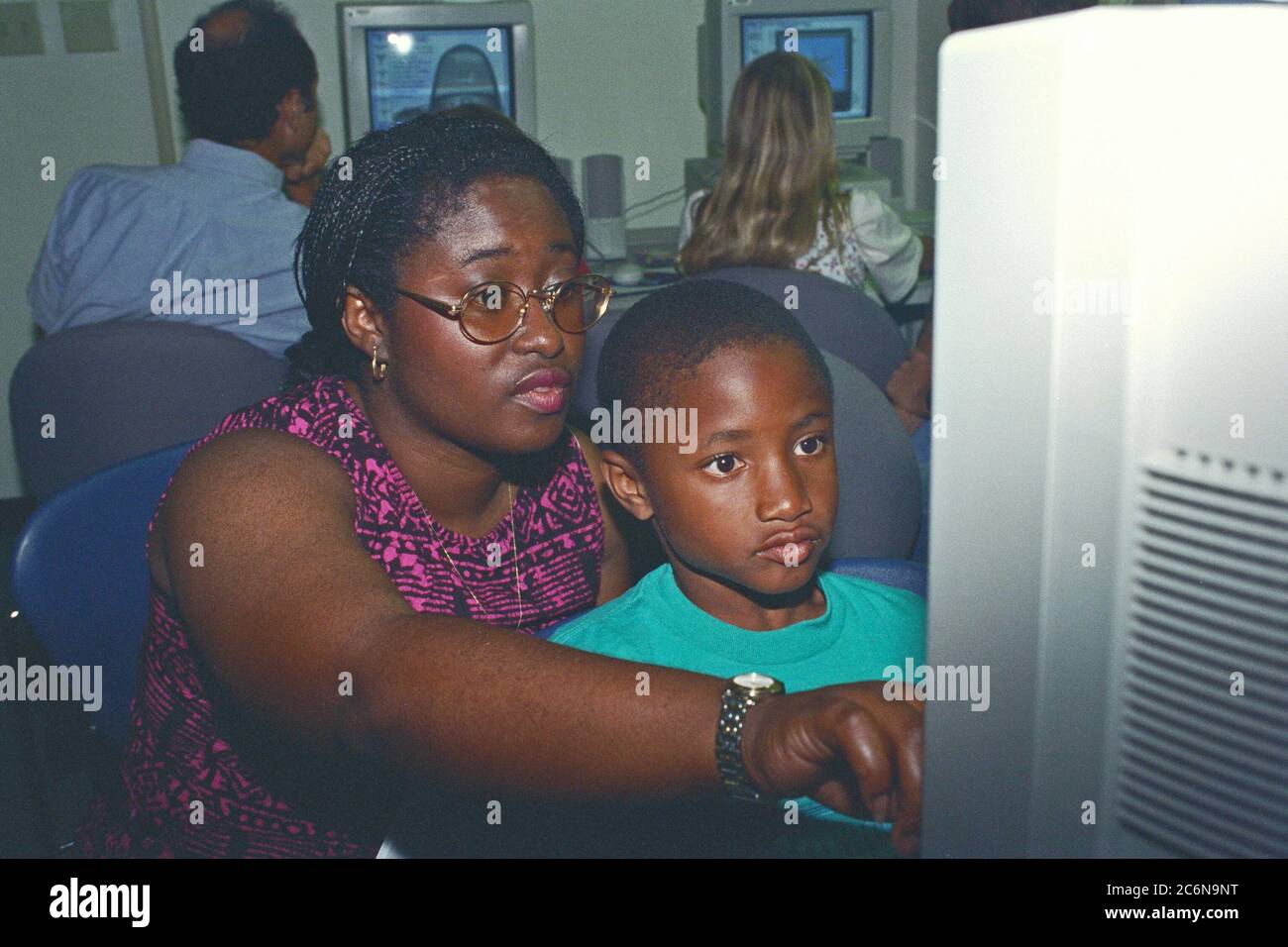 Child using a computer 1990s hi-res stock photography and images - Alamy