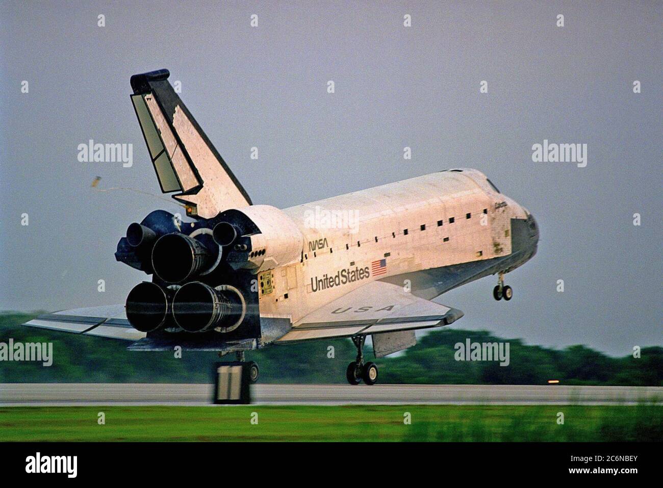 KENNEDY SPACE CENTER, FLA. -- The Space Shuttle orbiter Columbia touches  down on Runway 33 at KSC’s Shuttle Landing Facility at 6:46:34 a.m. EDT with  Mission Commander  James D. Halsell Jr. and Pilot Susan L. Still at the controls to  complete the STS-94 mission. Also on board are Mission Specialist Donald A. Thomas,  Mission Specialist Michael L. Gernhardt, Payload Commander Janice Voss, and Payload  Specialists Roger K. Crouch and Gregory T. Linteris. Stock Photo