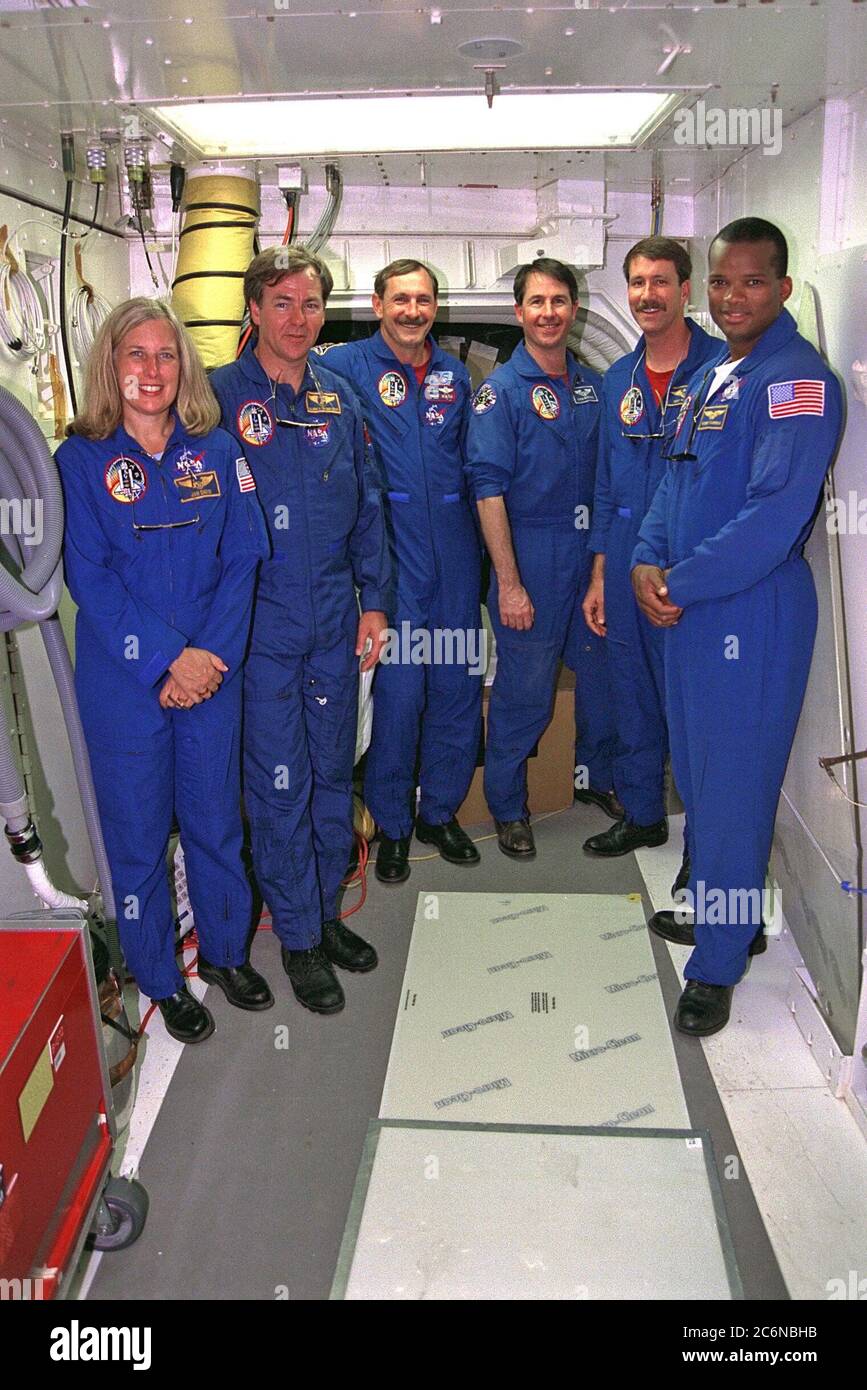 The STS-85 flight crew poses in the white room  at Launch Pad 39A during a break in Terminal Countdown Demonstration Test (TCDT)  activities for that mission. They are (from left): Payload Commander N. Jan Davis;  Payload Specialist Bjarni V. Tryggvason; Commander Curtis L. Brown, Jr.; Mission  Specialist Stephen K. Robinson; Pilot Kent V. Rominger; and Mission Specialist Robert  L. Curbeam, Jr. Stock Photo