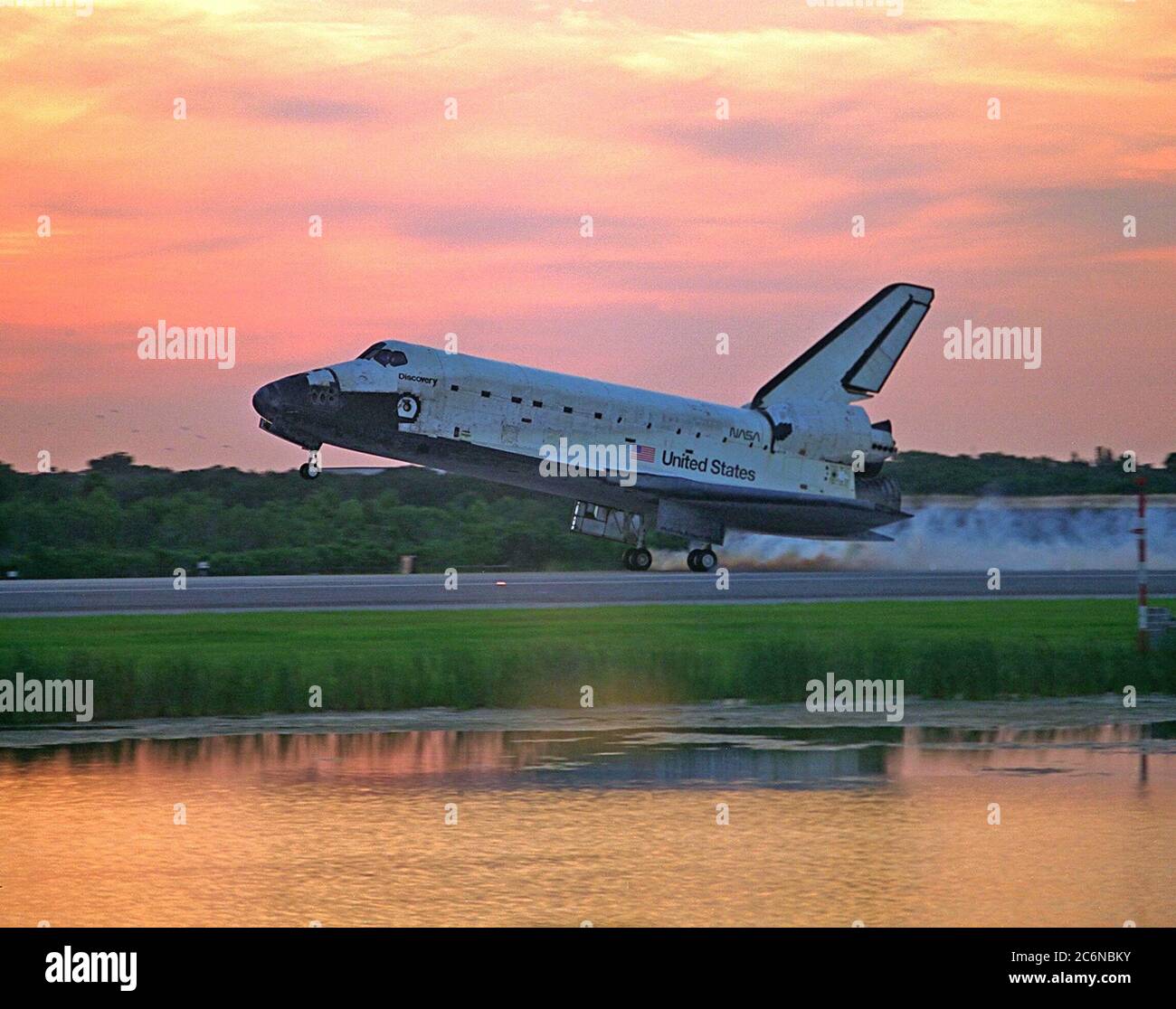 KENNEDY SPACE CENTER, FLA. -- With Commander Curtis L. Brown, Jr. and Pilot Kent V. Rominger at the controls, the Space Shuttle orbiter Discovery touches down on Runway 33 at KSC’s Shuttle Landing Facility at 7:07:59 a.m. EDT Aug. 19 to complete the 11-day, 20-hour and 27-minute-long STS-85 mission. Stock Photo