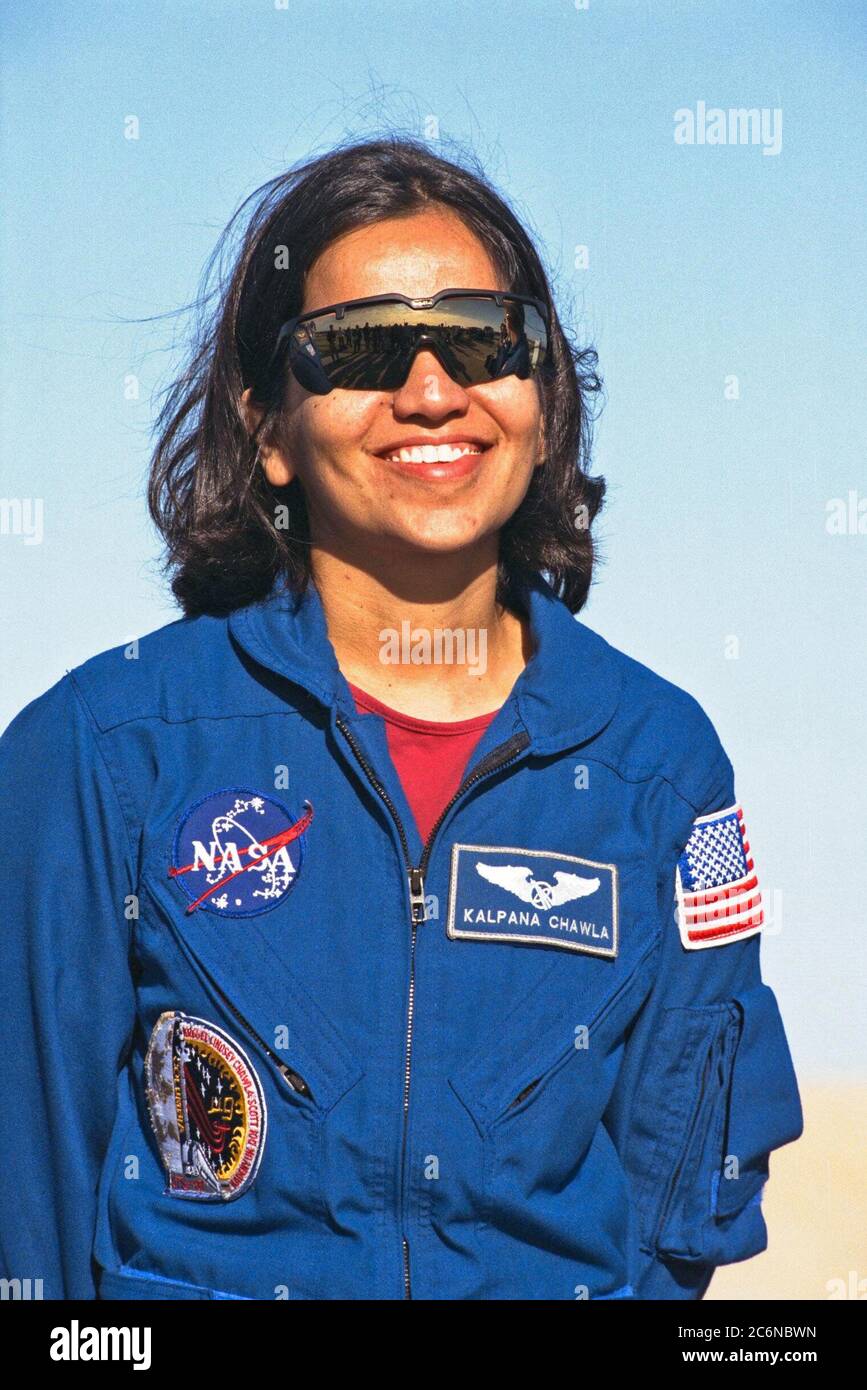Kalpana Chawla, Ph.D., a mission specialist of the STS-87 crew, participates in a news briefing at Launch Pad 39B during the Terminal Countdown Demonstration Test (TCDT) at Kennedy Space Center (KSC). First-time Shuttle flier Dr. Chawla reported for training as an astronaut at Johnson Space Center in 1995. Stock Photo