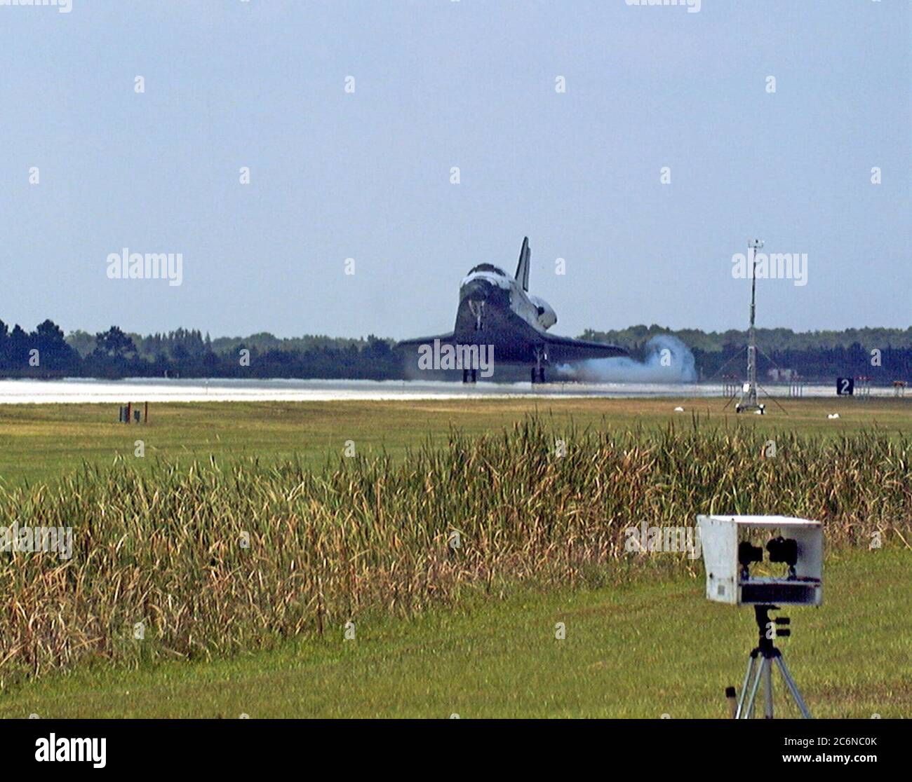 KENNEDY SPACE CENTER, FLA. -- The orbiter Discovery touches down on Runway 15 of KSC's Shuttle Landing Facility to complete the STS-91 mission. Main gear touchdown was at 2:00:18 p.m. EDT on June 12, 1998, landing on orbit 155 of the mission. The wheels stopped at 2:01:22 p.m. EDT, for a total mission-elapsed time of 9 days, 19 hours, 55 minutes and 1 second. Stock Photo