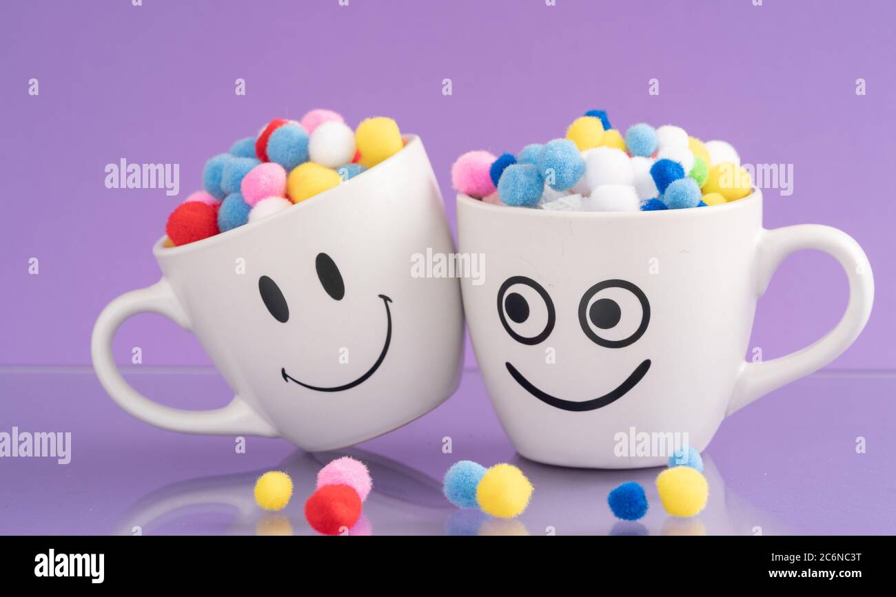 Couple of Happy Mug with smiley face. Happiness, smile, fresh and love Concept. Coffee for two Stock Photo