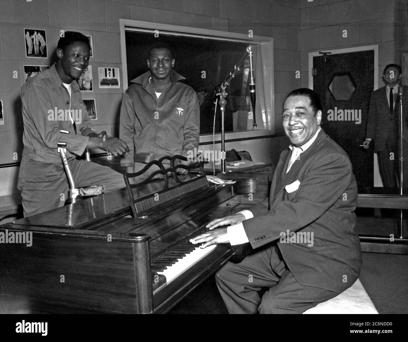 Jazz pianist Duke Ellington poses Nov. 3, 1954, at the KFG Radio Studio for Fitzsimons Army Medical Center in Aurora, Colorado. Ellington played three shows at Travis Air Force Base, California, in the 1950s and 1960s, one of which was released as a live album in the 1980s.(U.S. Army photo) Stock Photo