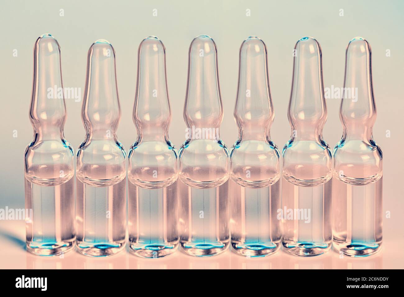 Glass medical ampules in pink and blue colors Stock Photo Alamy