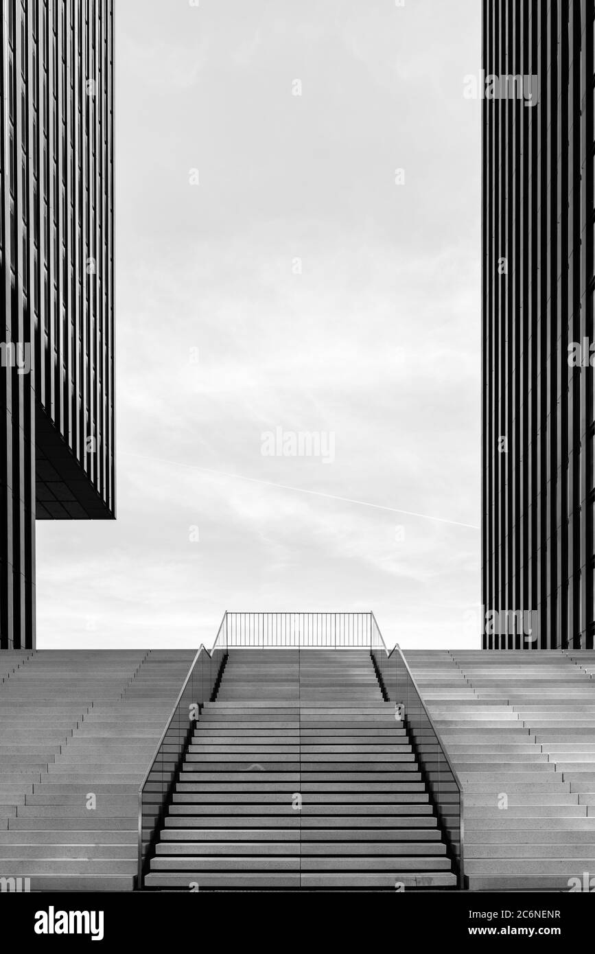 Wide stairway between two modern office buildings at the Medienhafen (media harbour) in Düsseldorf, Germany. Toned. Stock Photo