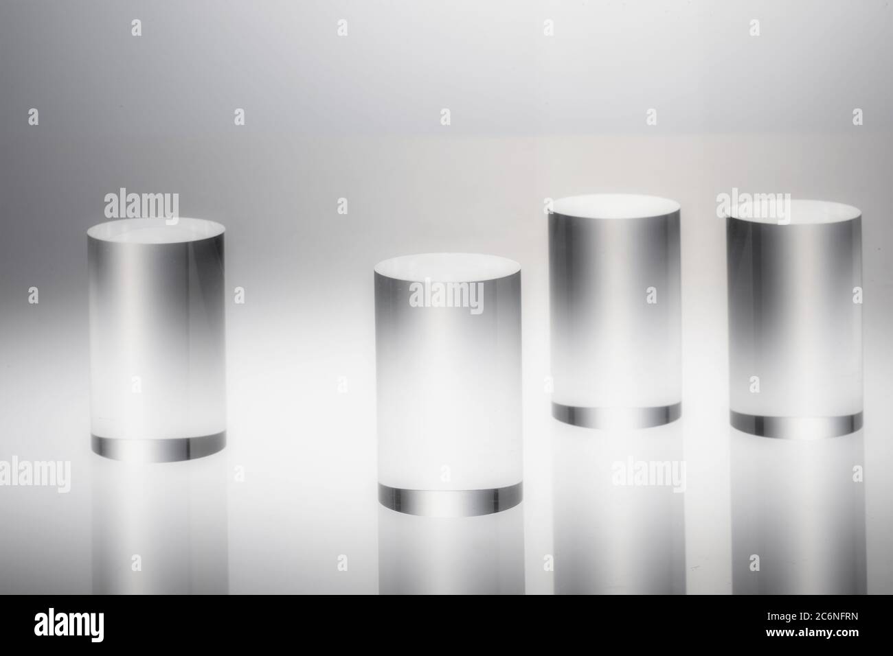 Blank shelf stand for showing product. transparent cylinder. Stock Photo