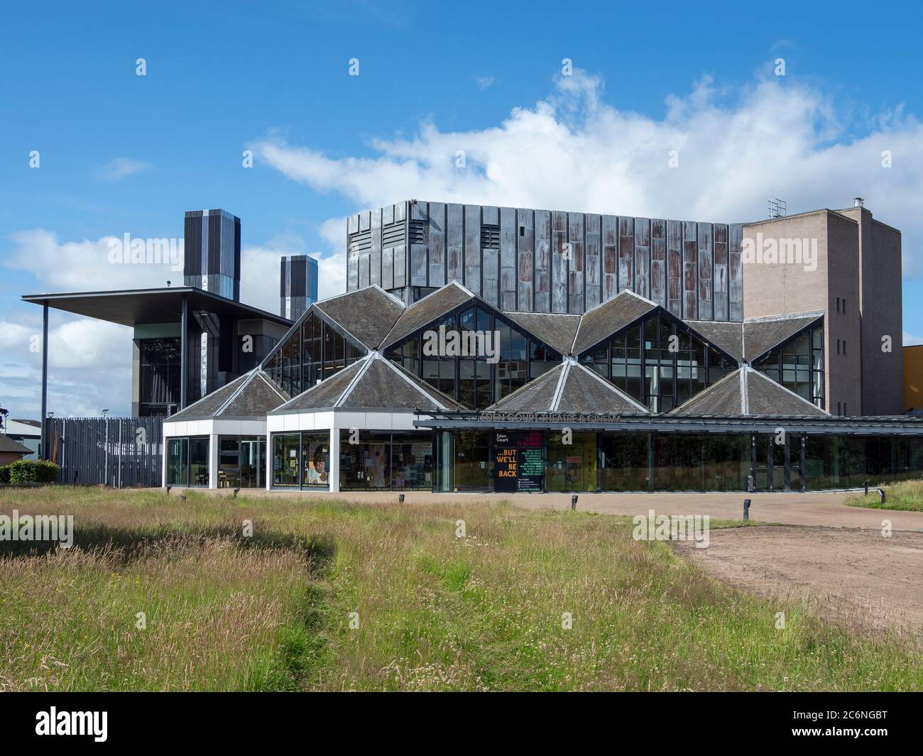 Eden Court Theatre closed during Covid-19 lockdown, Inverness, Highland, Scotland. Building seen with overgrown grass. Stock Photo