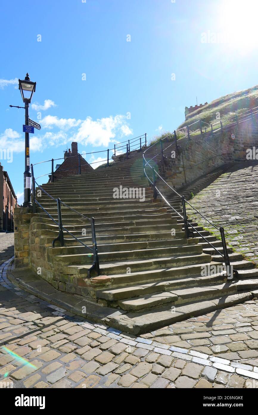 The Famous 199 steps to Whitby Abbey with Blue Sky background, North Yorkshire, England, UK Stock Photo