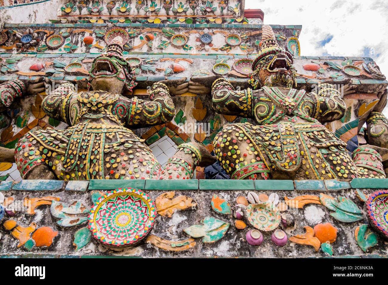 Stunning view of demon guardians supporting Wat Arun Temple, Bangkok, Thailand Stock Photo