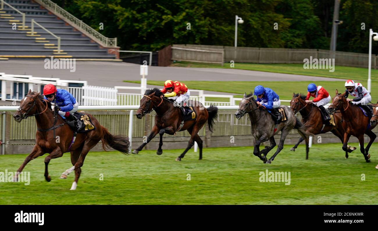 Jockey Oisin Murphy riding Stunning Beauty to win The bet365 Novice Stakes on day three of The Moet and Chandon July Festival at Newmarket Racecourse. Stock Photo