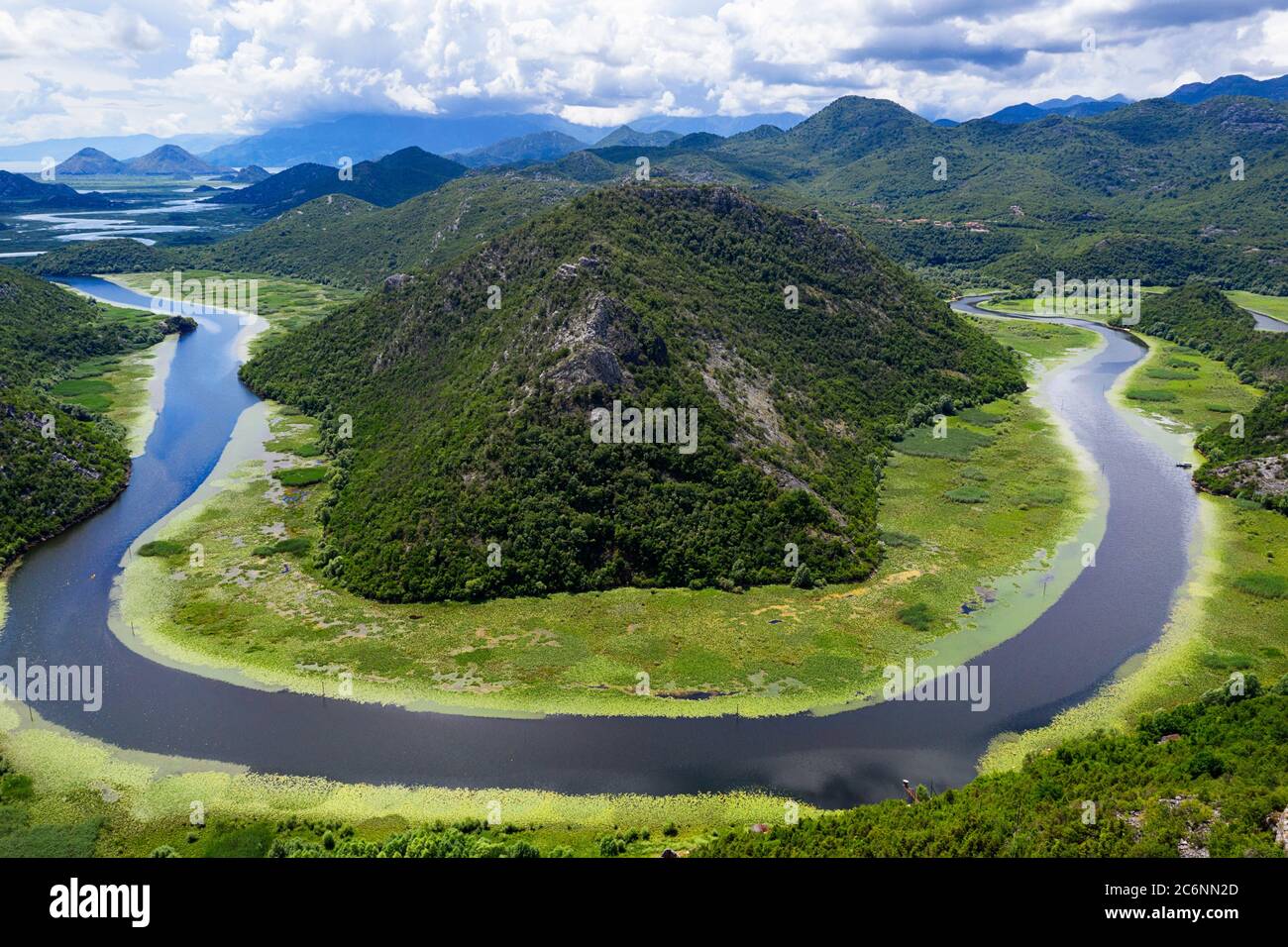 Aerial view of river bend of the river Rijeka Crnojevica and lake Skadar, view from the viewpoint, taken by drone near Cetinje Stock Photo