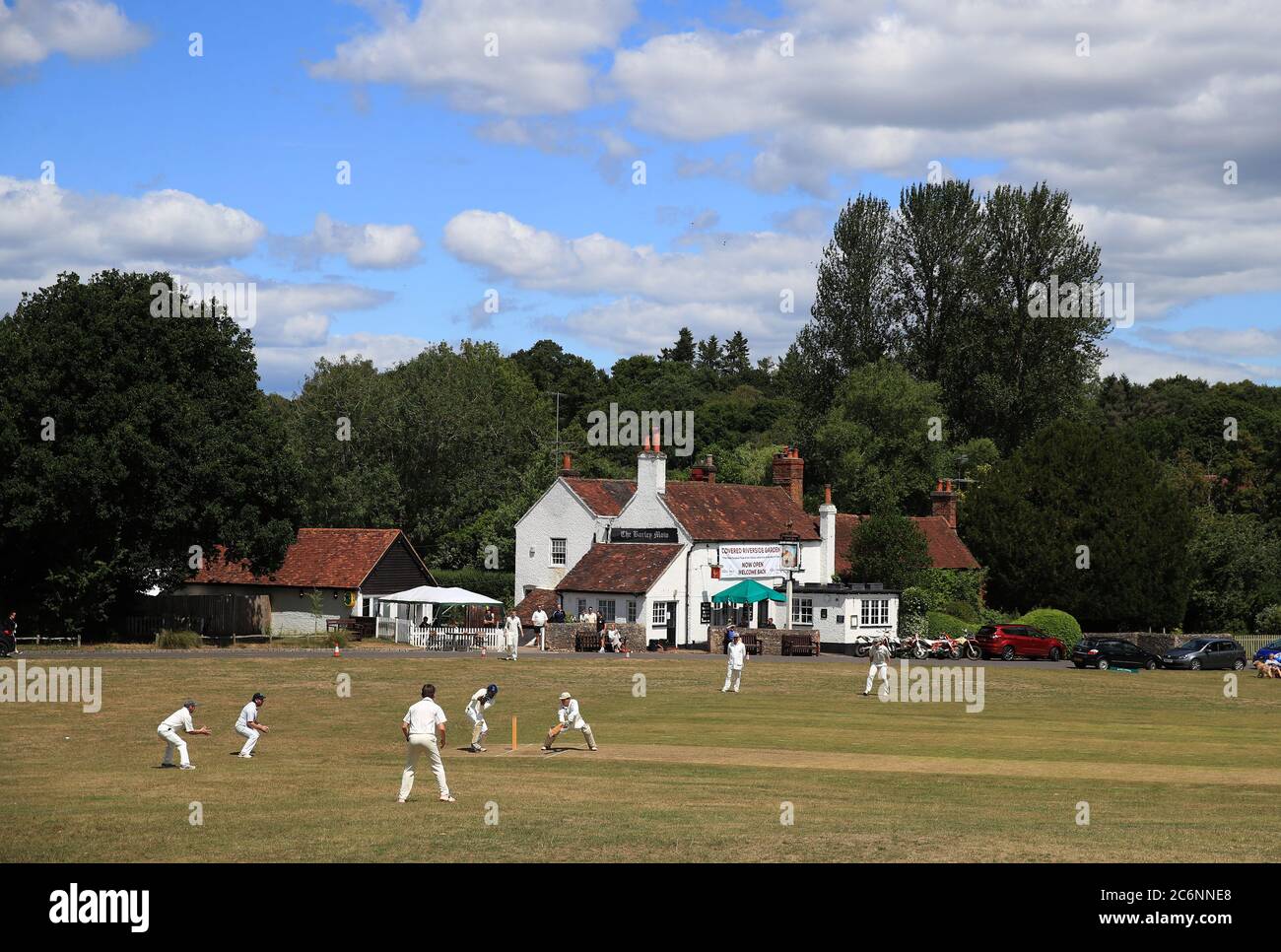 Inter village friendly cricket match at Tilford Cricket Club, Farnham. Stock Photo