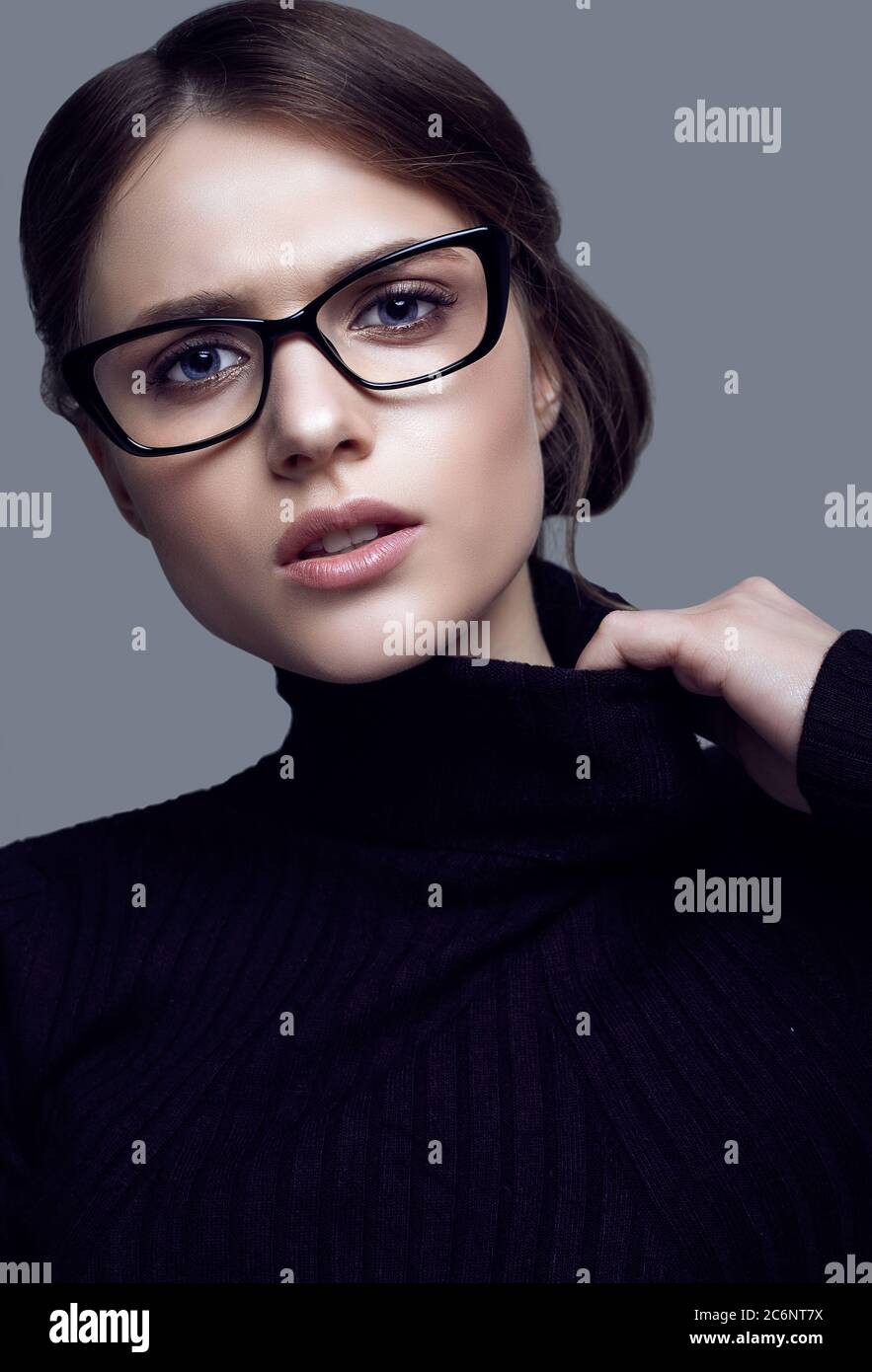 Portrait of cute student girl wearing black turtleneck sweater and