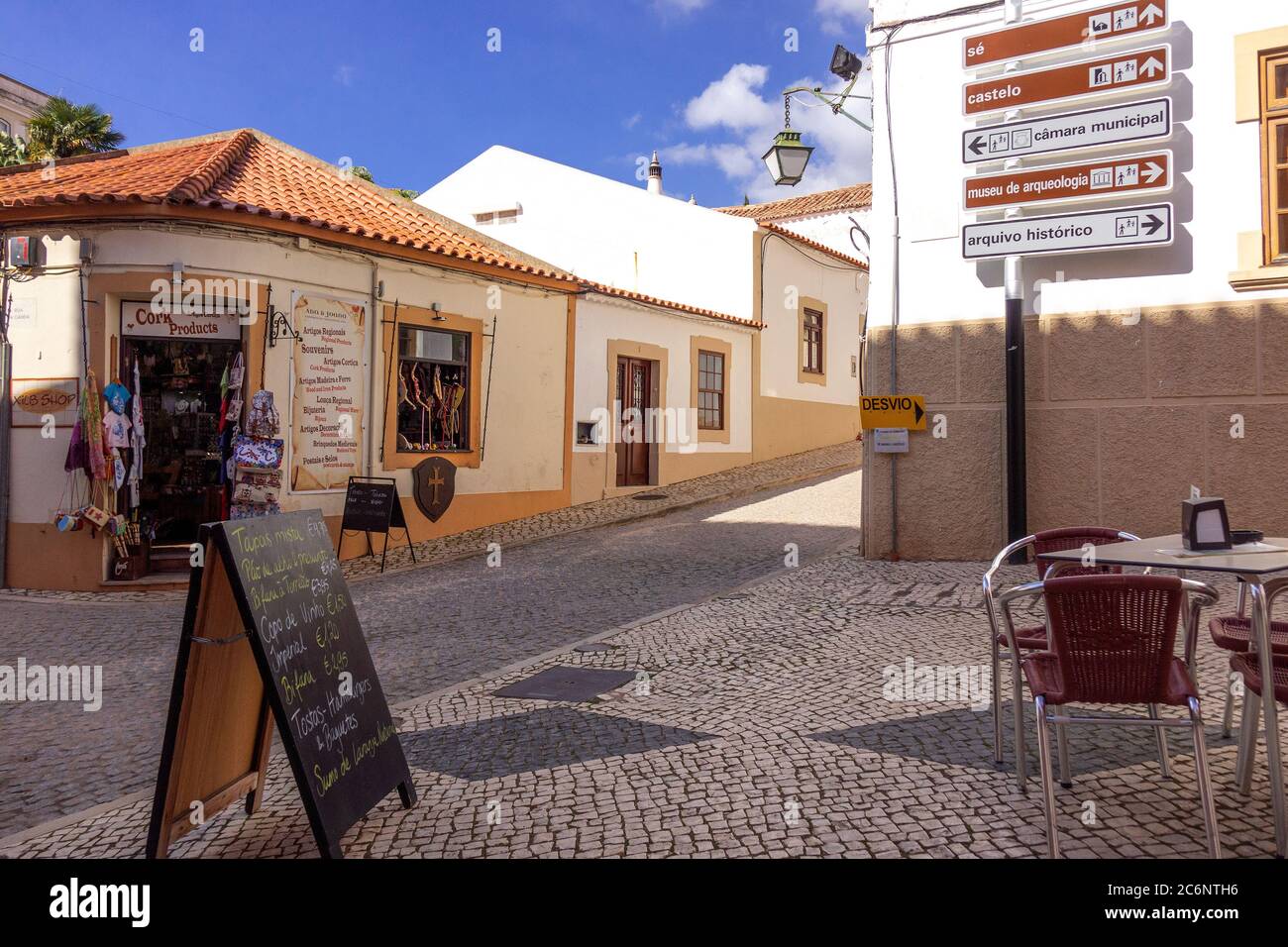 Street Corner In Silves Portugal With A Cork And Souvenir Shop And Cafe Stock Photo