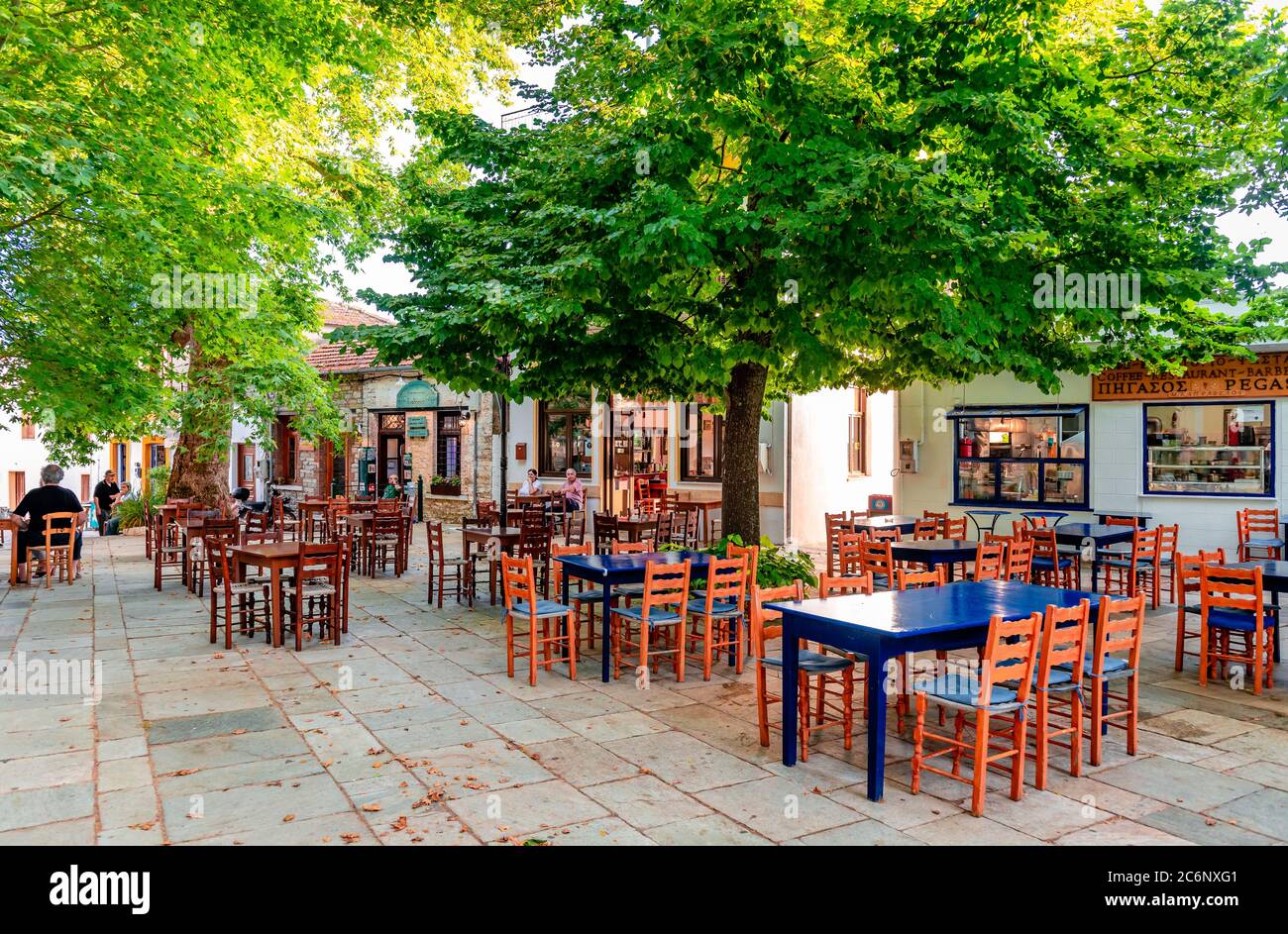 Lafkos Greece July 4 2020 View Of The Historic Square Of The Village With Cafeterias And Restaurants And Many Plane Trees Stock Photo Alamy