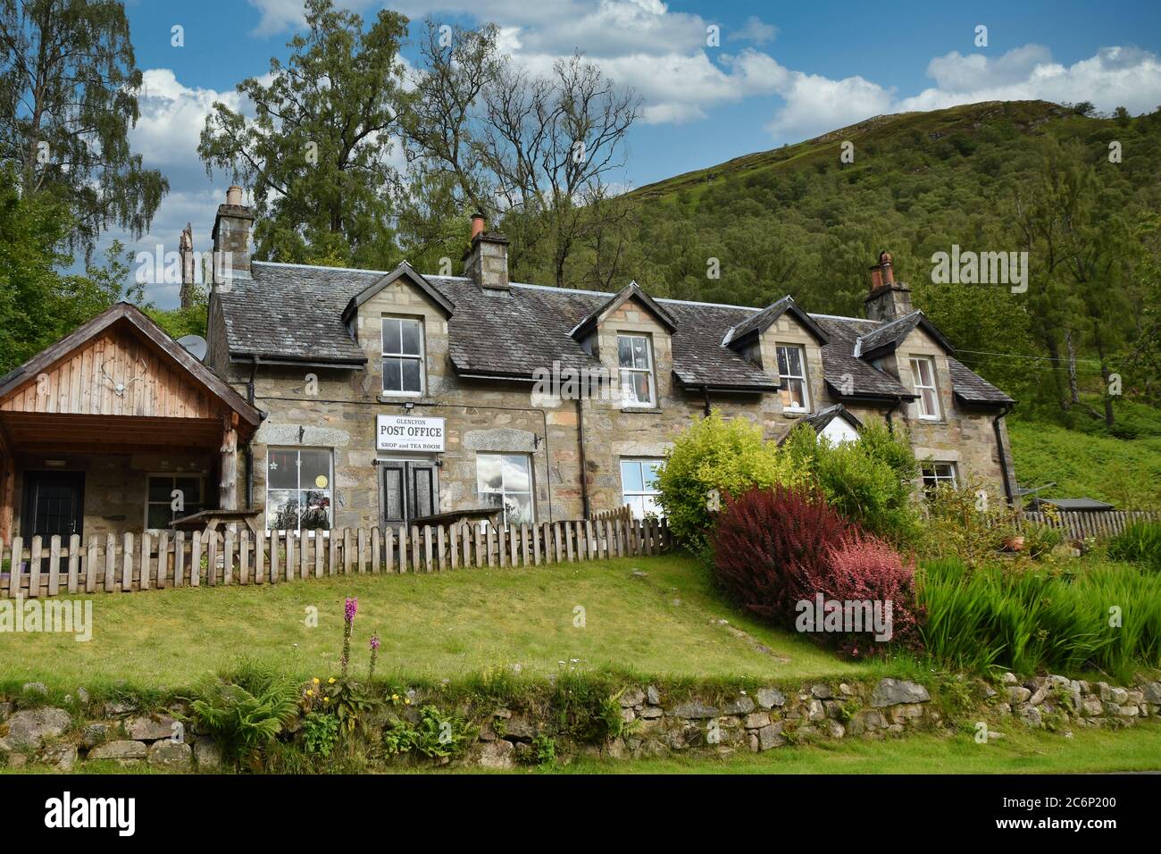 Glen Lyon post office, shop and tea room in Bridge of Balgie, Scottish Highlands on a summer day with blue sky and cloud Stock Photo