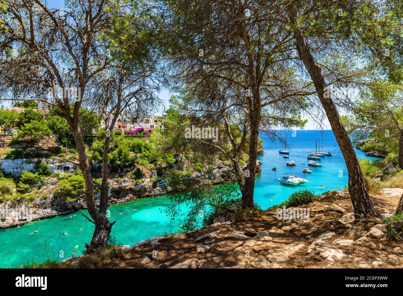 Beautiful bay with yachts boats and turquoise sea water, Cala Pi on Majorca island, Spain Mediterranean Sea Stock Photo