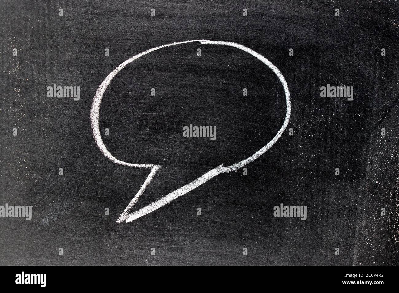 White chalk hand drawing in round bubble speech shape with blank space ...