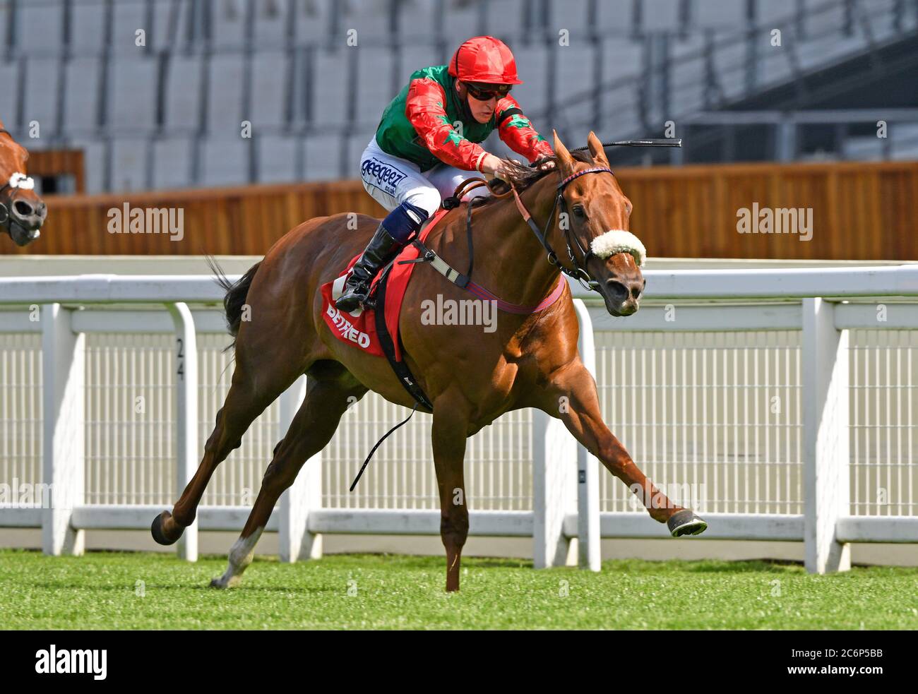 Jawwaal ridden by Callum Rodriguez wins the Betfred Heritage Handicap Stakes at Ascot Racecourse, Berkshire. Stock Photo